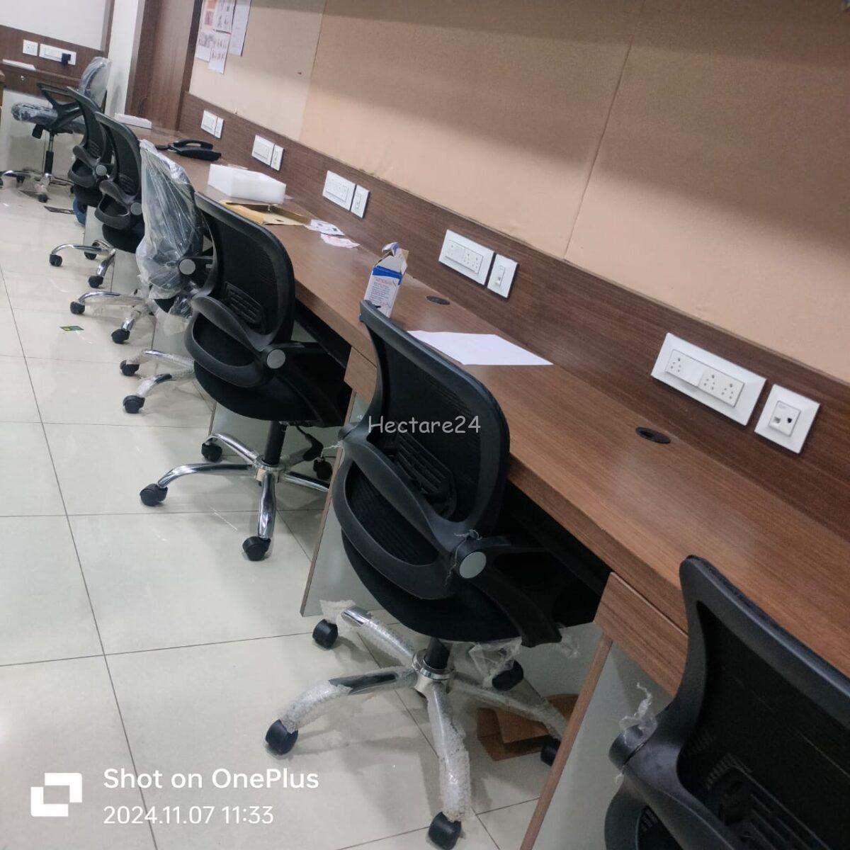 "Fully furnished office space in Astra Towers, New Town Kolkata, available for rent. Features include 800 sq. ft. built-up area, 2 cabins, 10 workstations, reception, pantry, parking, and common washroom."